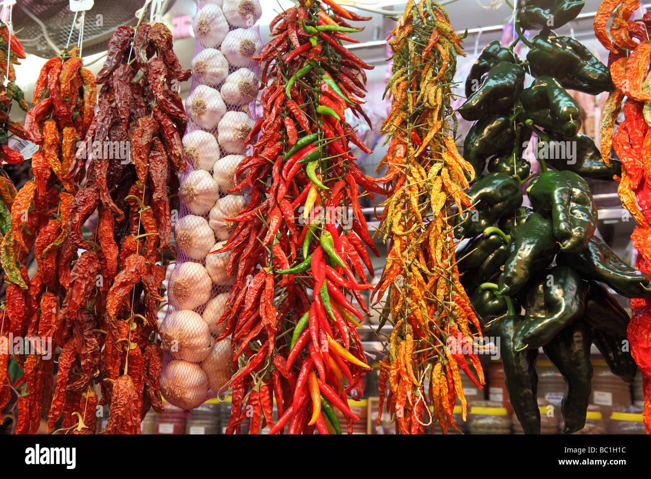 Dried chilis La Boqueria market hall Barcelona Catalunya Spain Stock Photo