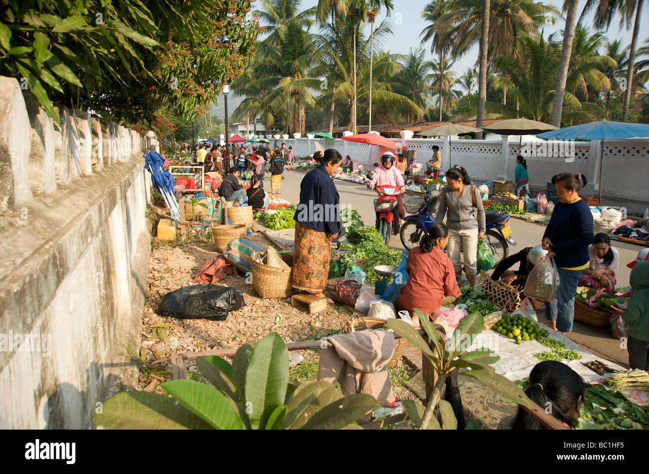 The daily fresh food market in the old Lao Royal capital of Luang Prabang Stock Photo