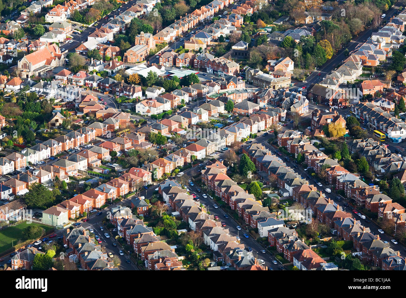 Aerial view of streets and houses. Charminster, Bournemouth, Dorset, UK