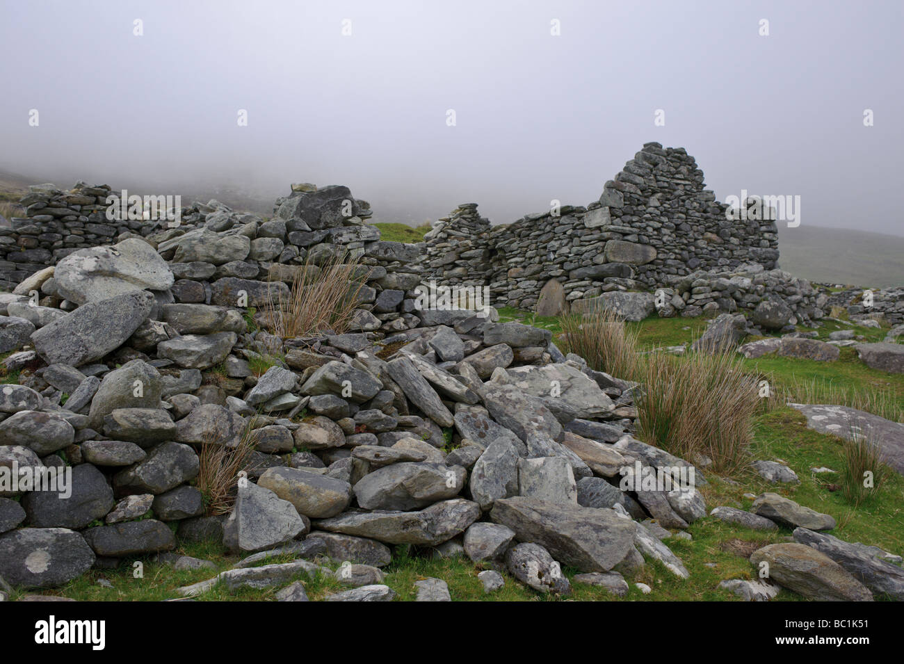 Slievemore deserted village on Achill Island in County Mayo Ireland with its rock home ruins Stock Photo