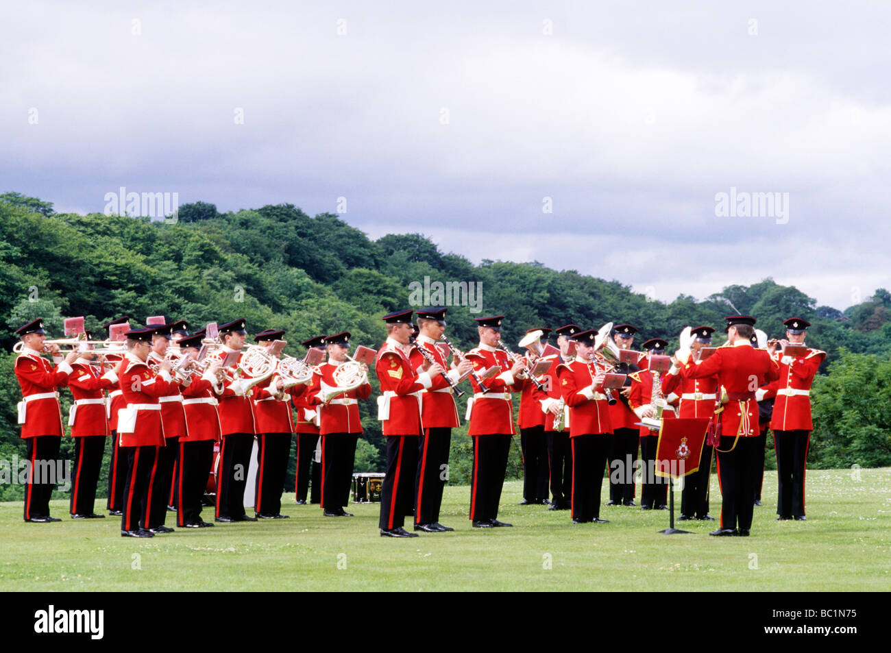 Re-enactment of Normandy Brass Band of the Kings Division British military music red tunics uniform soldiers musical instrument Stock Photo