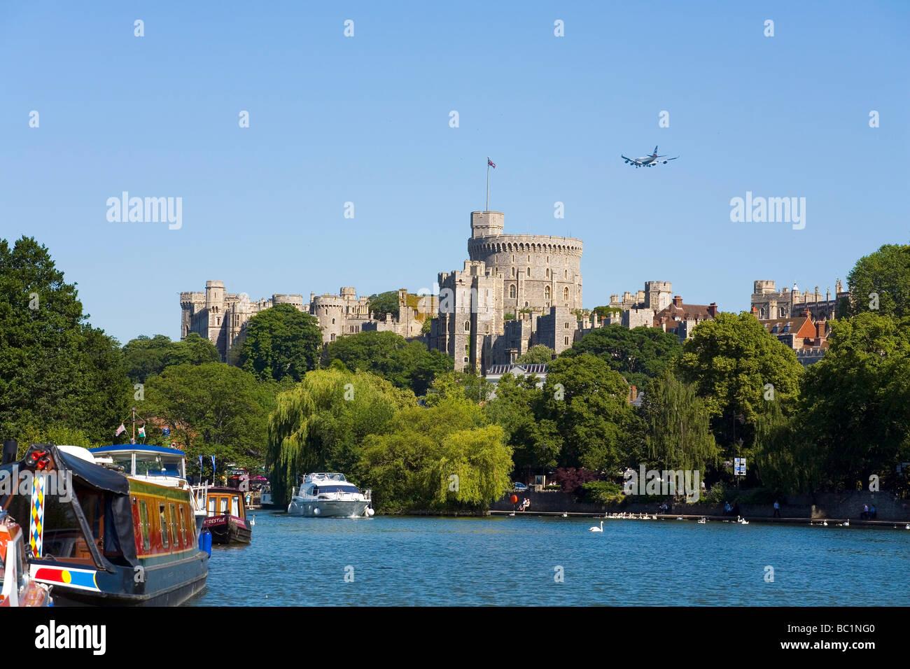Windsor Castle England with BA jet on Landing path to Heathrow. ( clck below thumb to see 14 other nice shots without aircraft!) Stock Photo