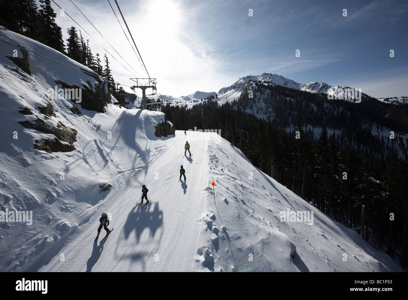 Children learning to ski on the uncrowded slopes of Whistler Mountain part of the venue for the 2010 winter olympic games Canada Stock Photo