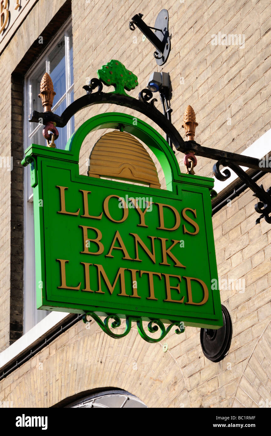 Old fashioned Lloyds Bank Limited Sign outside Lloyds TSB Bank, Bury St Edmunds Suffolk England UK Stock Photo