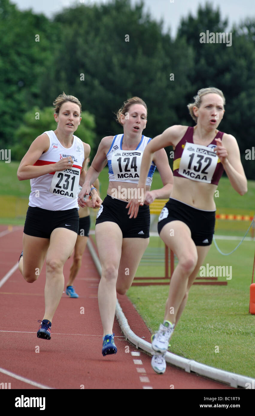 Runners in a middle distance track race Stock Photo Alamy