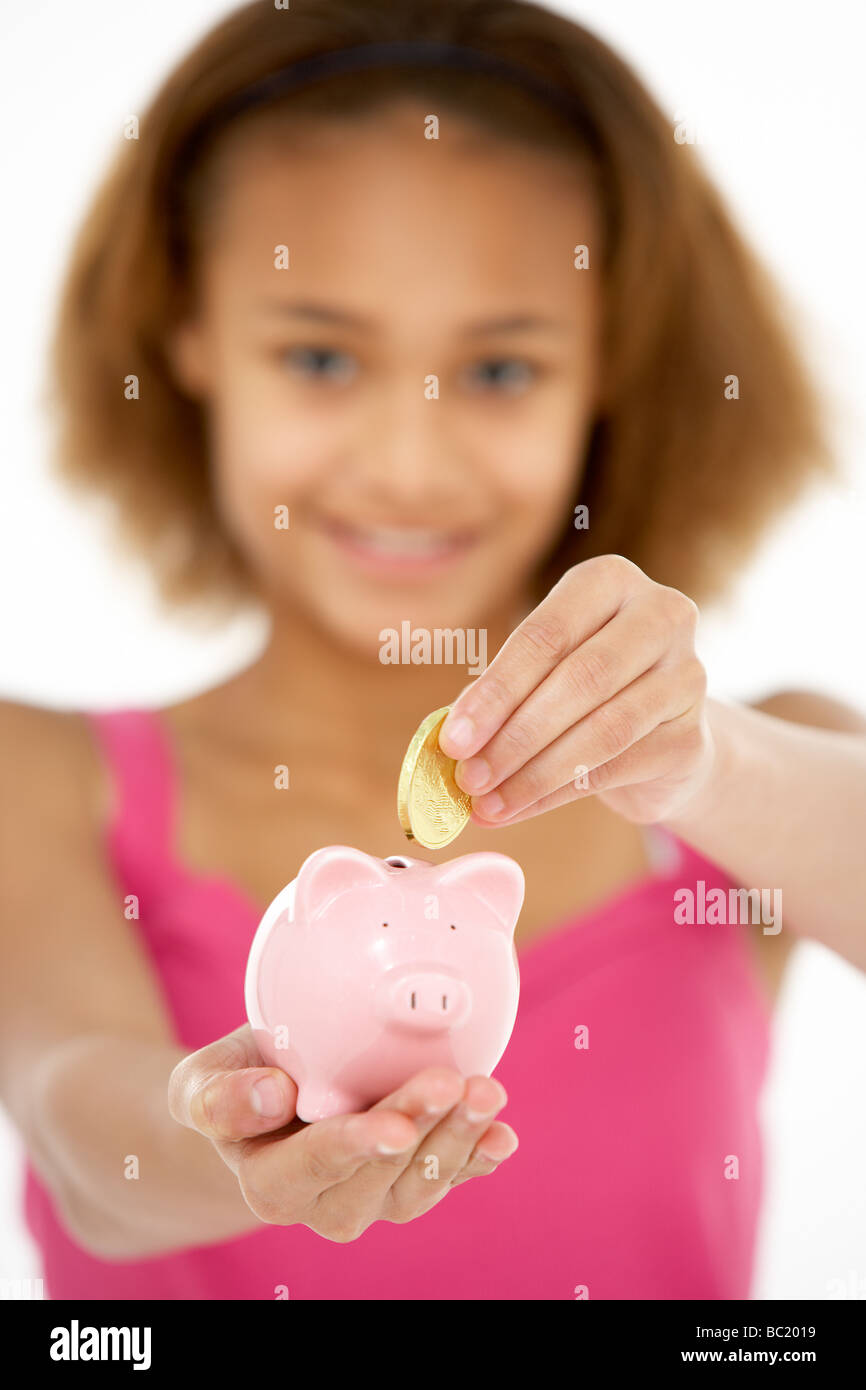 Young Girl Holding Piggy Bank Stock Photo - Alamy