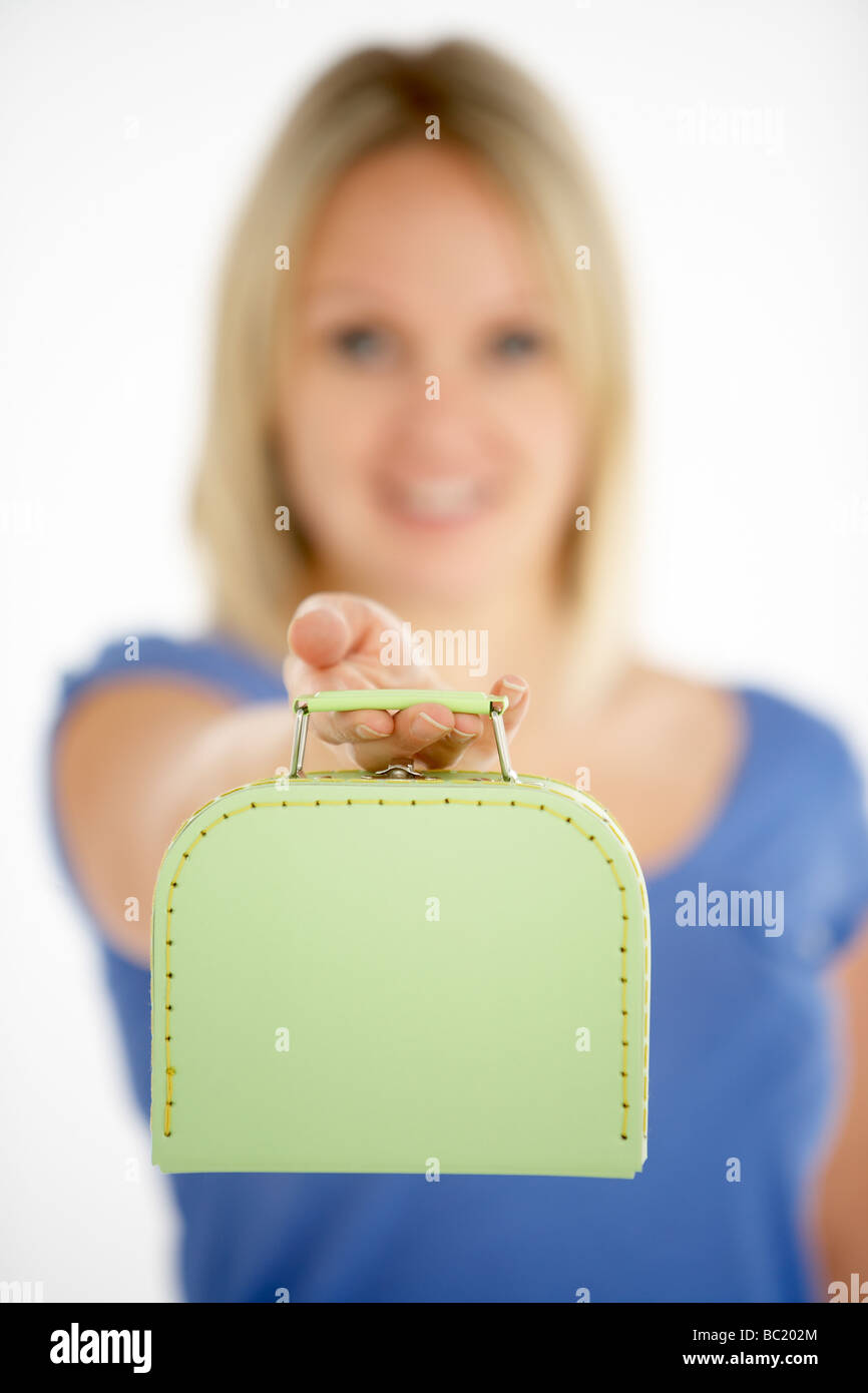 Woman Holding Suitcase Stock Photo - Alamy