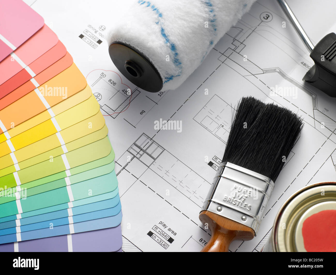Decorating Equipment On House Plans Stock Photo