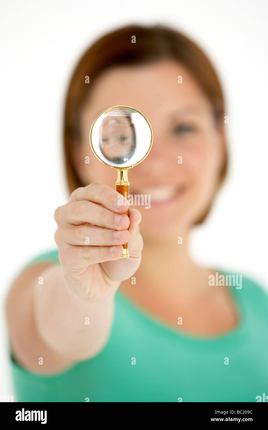 Woman Holding Magnifying Glass Stock Photo - Alamy