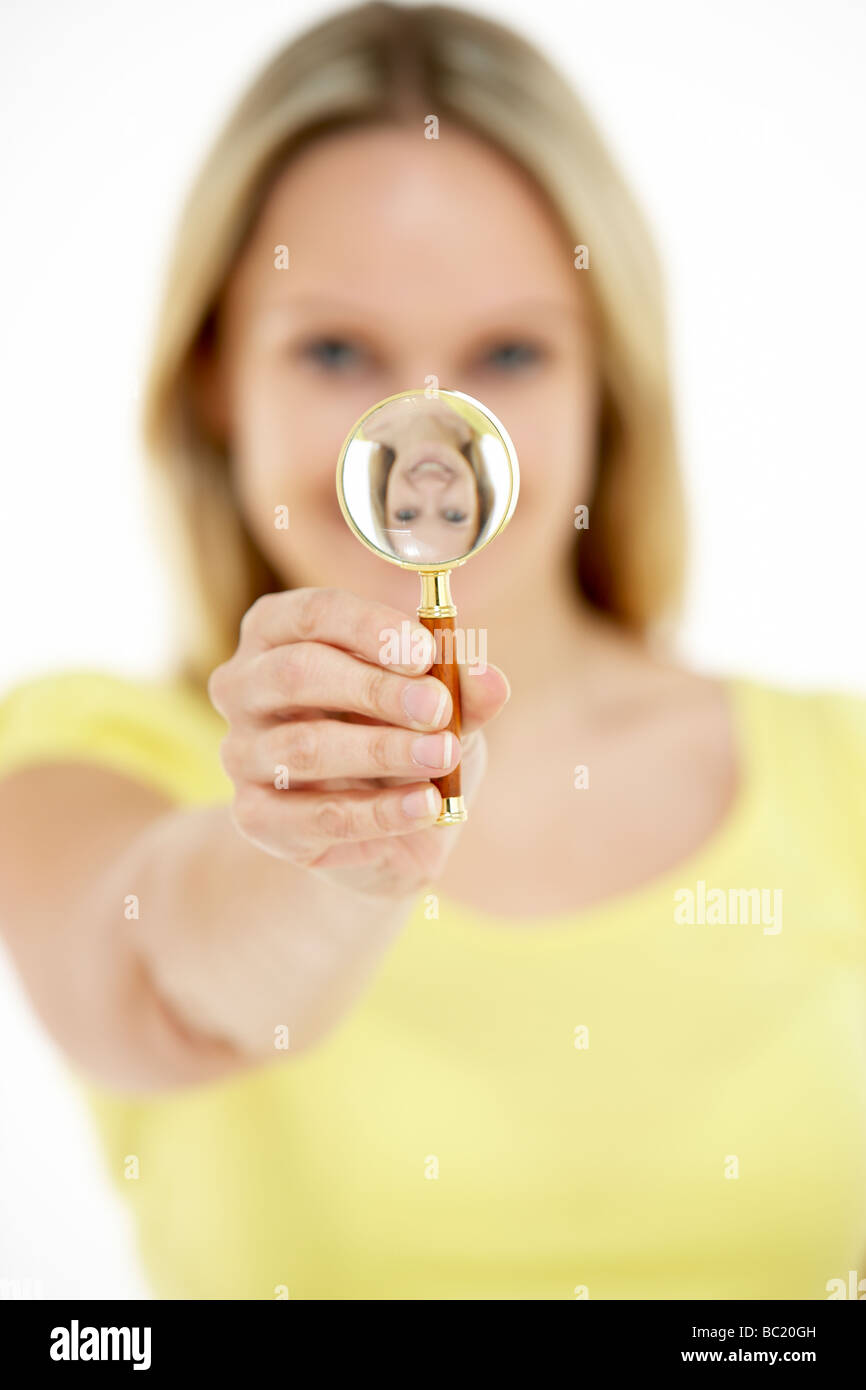 Woman Holding Magnifying Glass Stock Photo - Alamy