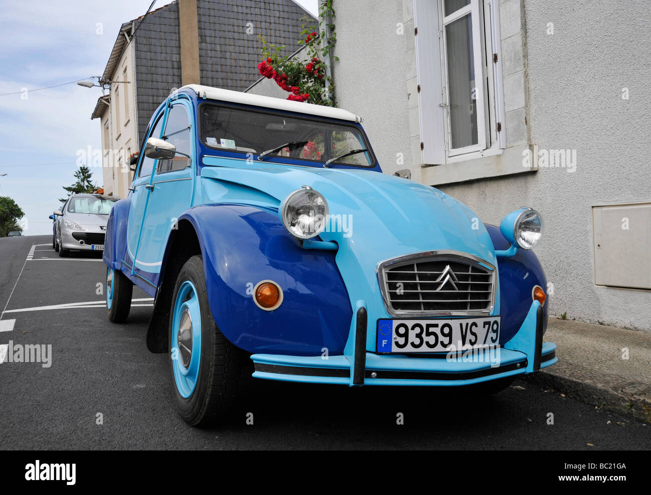 Old classic Citroen 2cv motor car parked in France Stock Photo