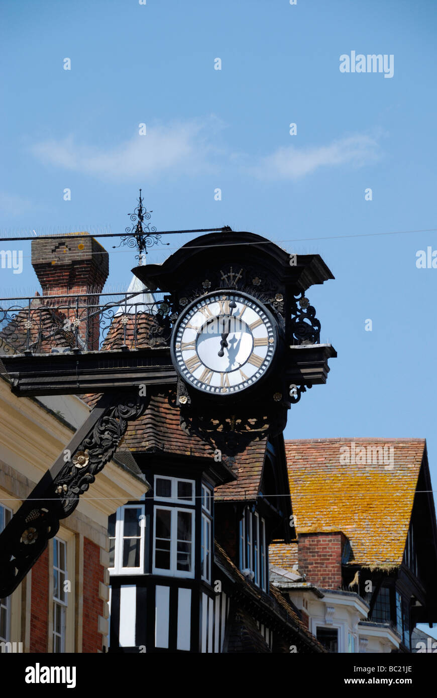 Old Gildhall clock and buildings in Winchester High Street Stock Photo
