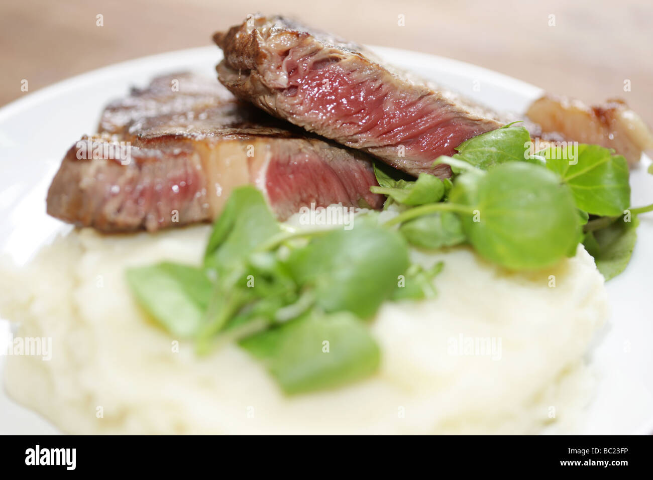 Steak with Mash Potato and Watercress Stock Photo - Alamy