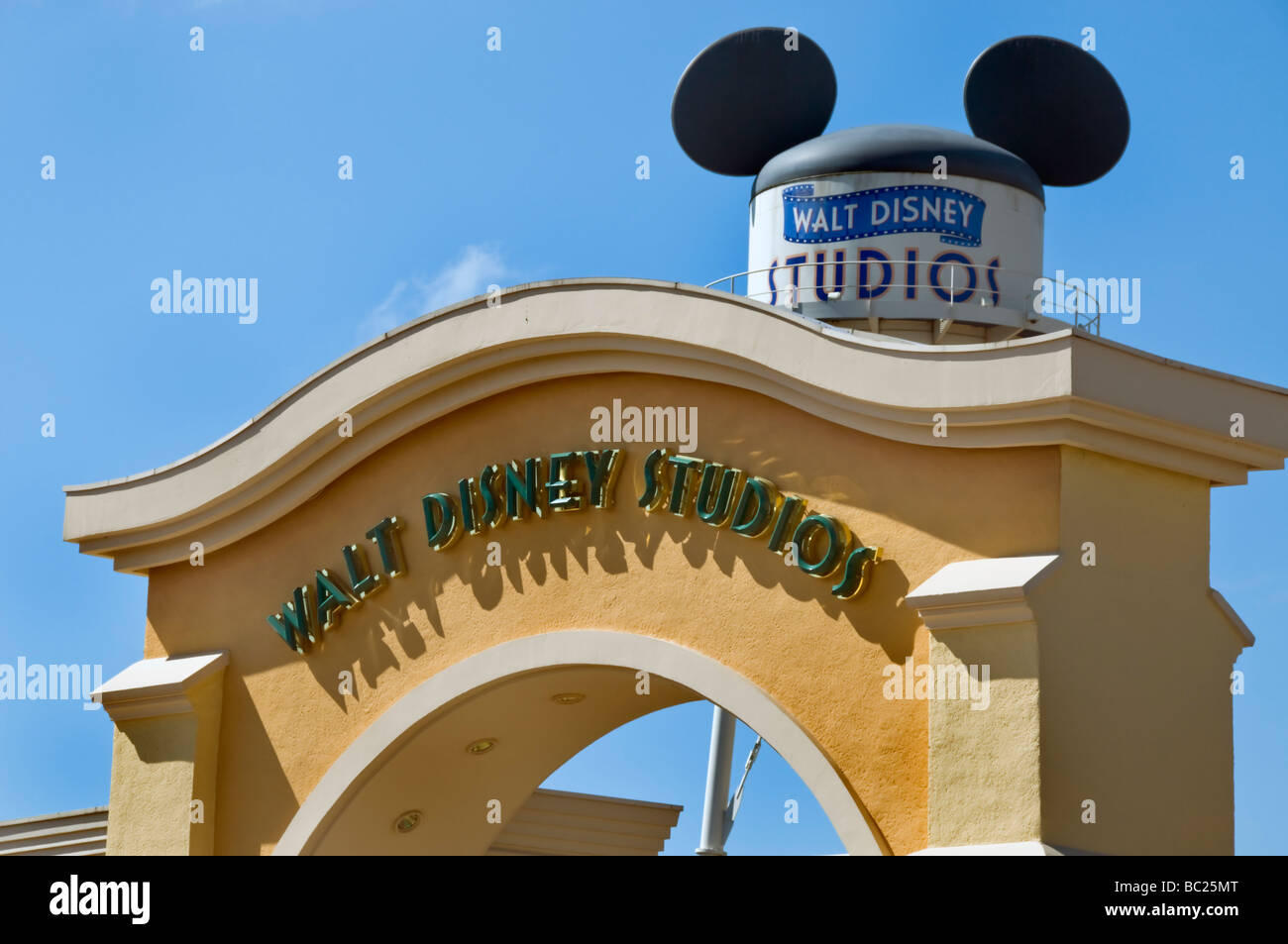 France, Theme Parks, Disneyland Paris, Entrance Gate 'Walt Disney Studios' Detail SIgn with Water Tower 'Mickey Mouse' Stock Photo