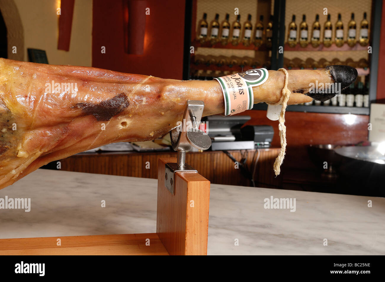 Cutting Spanish ham, process of preparation and it cuts Stock Photo Alamy