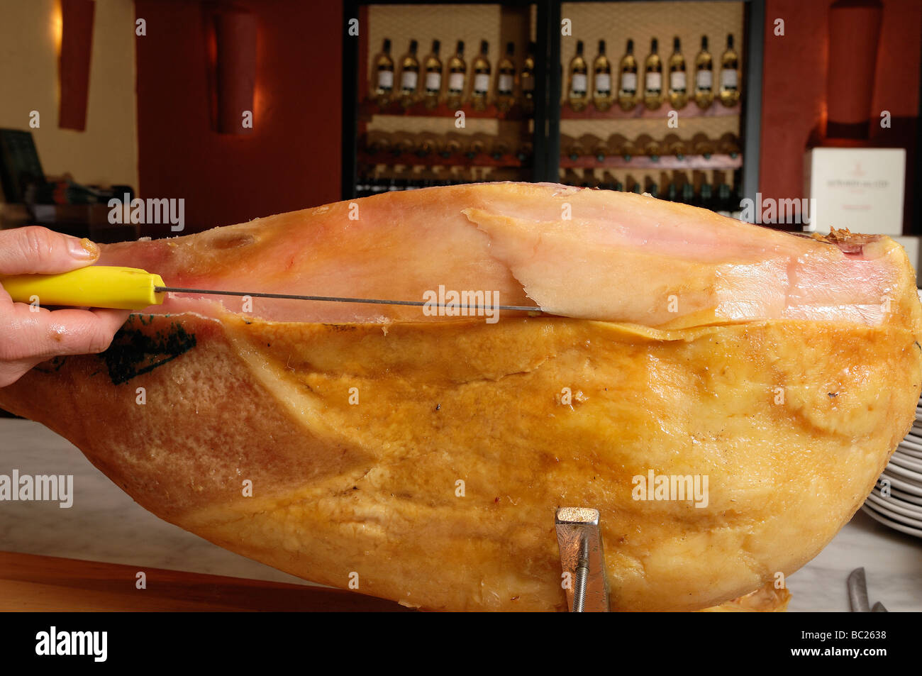 Cutting Spanish ham, process of preparation and it cuts Stock Photo Alamy