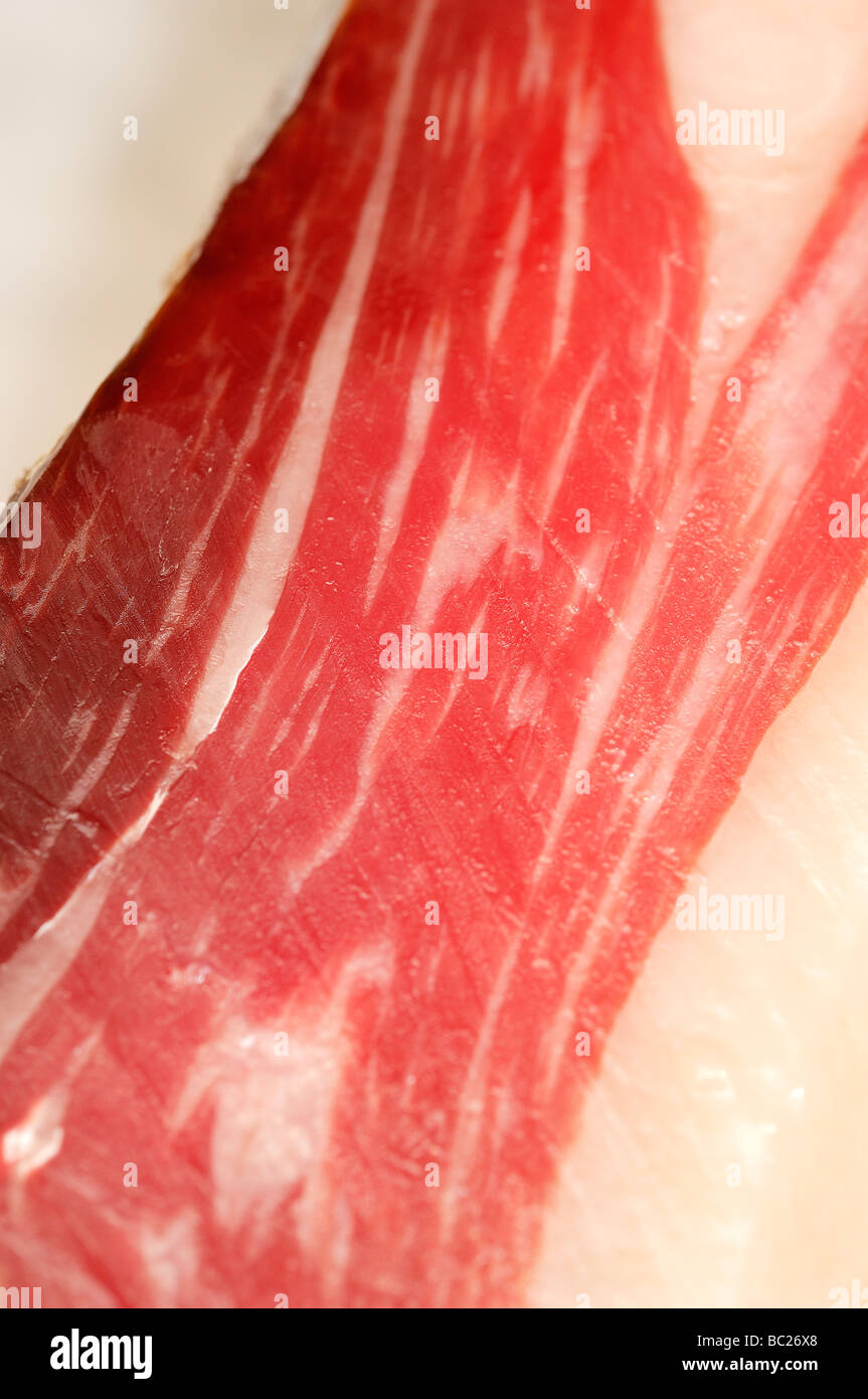 Cutting Spanish ham, process of preparation and it cuts Stock Photo Alamy