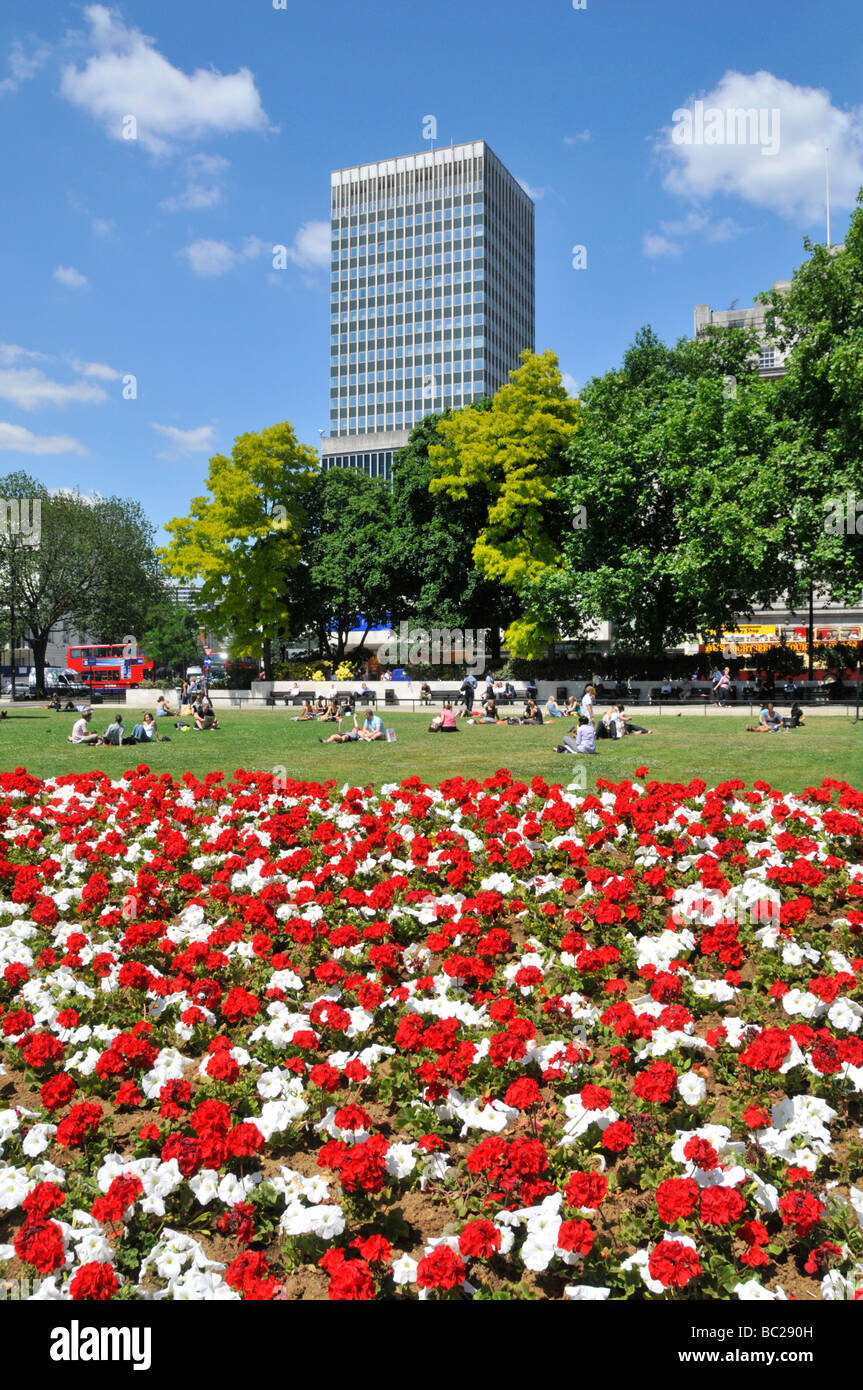 The Marble Arch traffic junction and roundabout with summer flower beds ...