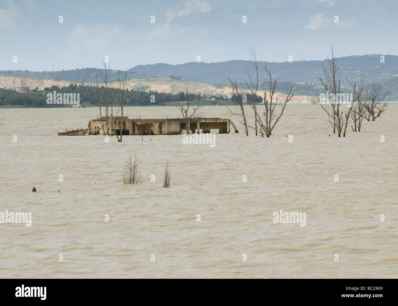 Climate change in Tunisia. Flooded house. Stock Photo