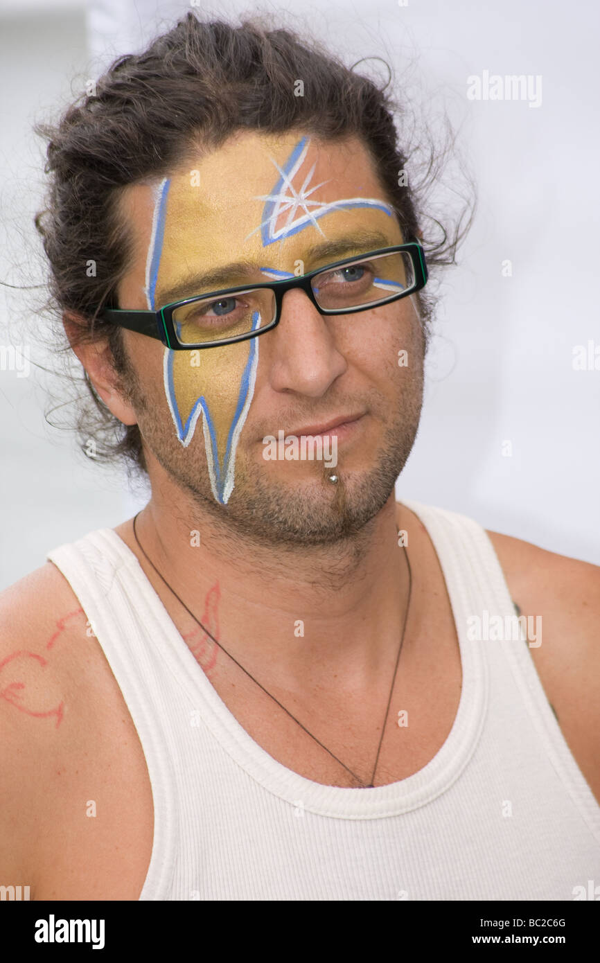 glasses male facepaint facepainter looking latin american tottenham  festival bruce castle london england UK europe Stock Photo - Alamy