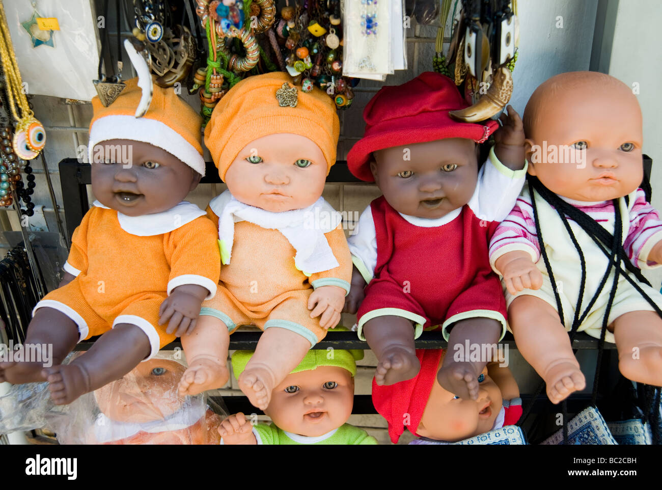 Black and white dolls on a market stall Stock Photo