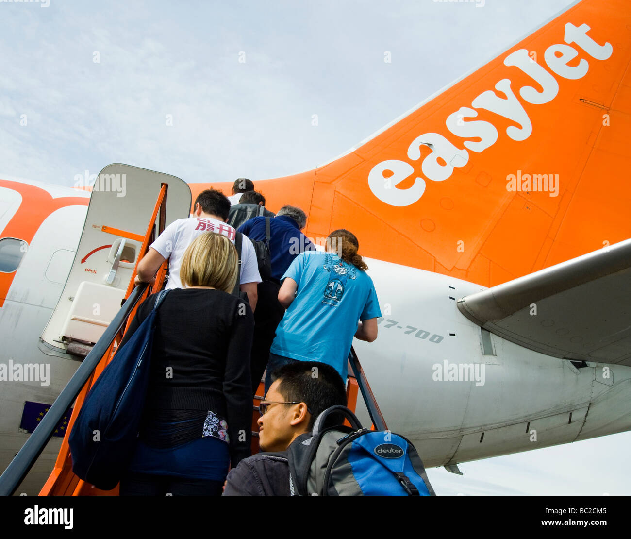 Passengers boarding an Easyjet plane Stock Photo Alamy