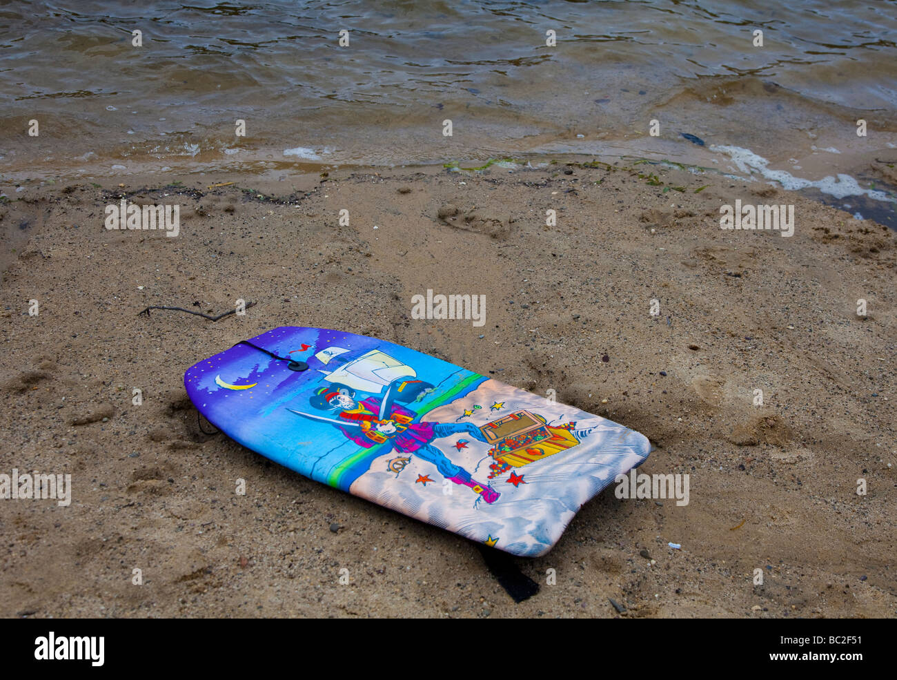 A boogie board on the beach Stock Photo Alamy
