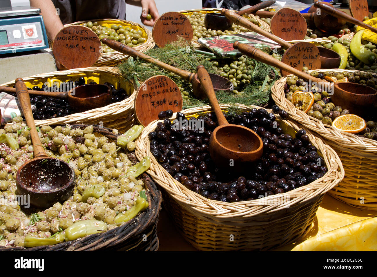 Baskets of olives on a French market stall Stock Photo Alamy