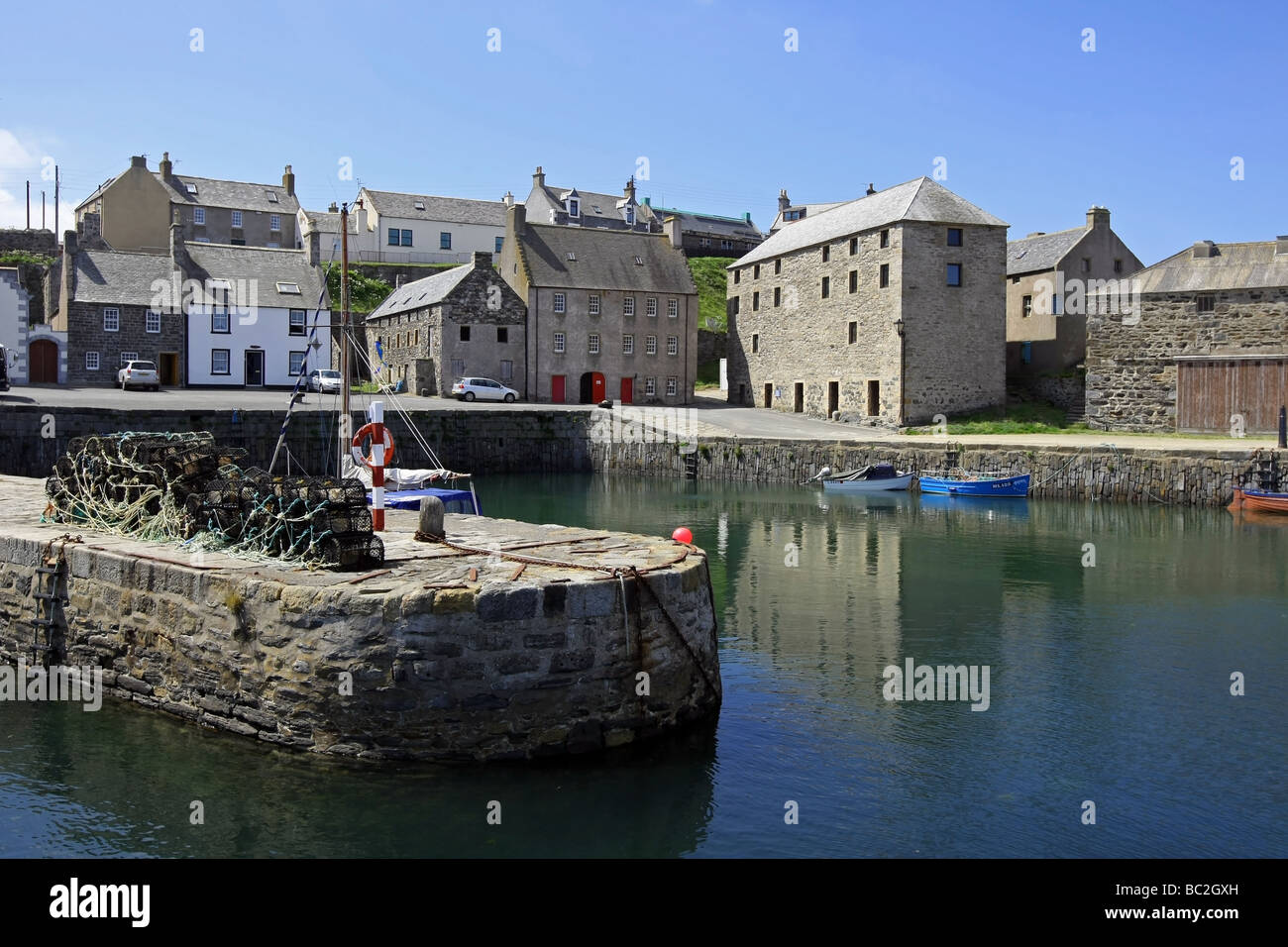 The historic harbour of Portsoy, Aberdeenshire, Scotland, UK, which hosts the Boat Festival annually Stock Photo