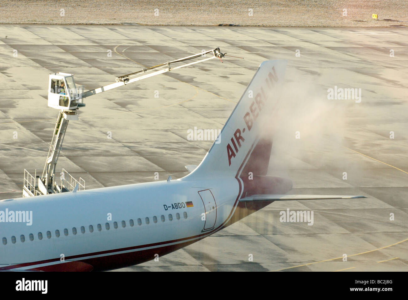 DeIcing of Airbus A320 at Tegel Airport in Berlin Stock Photo Alamy