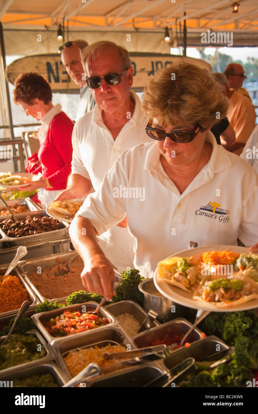 Sea Ray Club members making fish tacos at The Endless Summer bar cafe