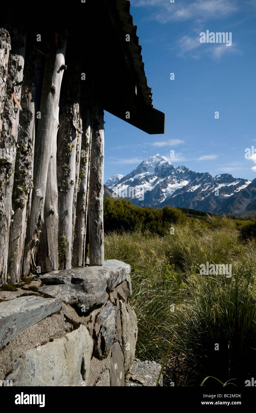 Stocking Stream hikers shelter in the Hooker Valley - Mt Cook visible in the background Stock Photo