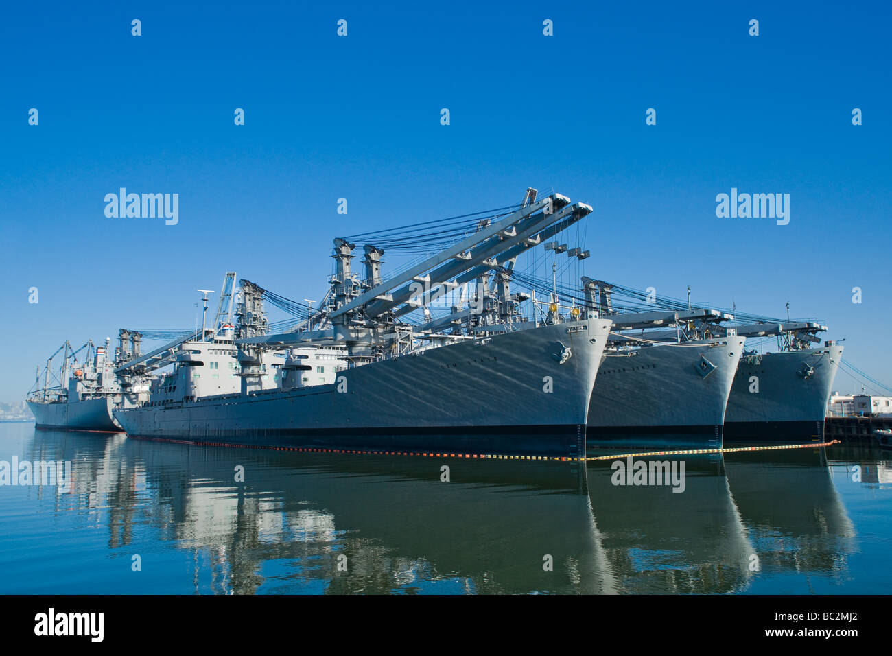 Ships of the US Military Sealift Command reserve fleet tied up in Alameda, California. USNS Gem State is closest to the camera. Stock Photo