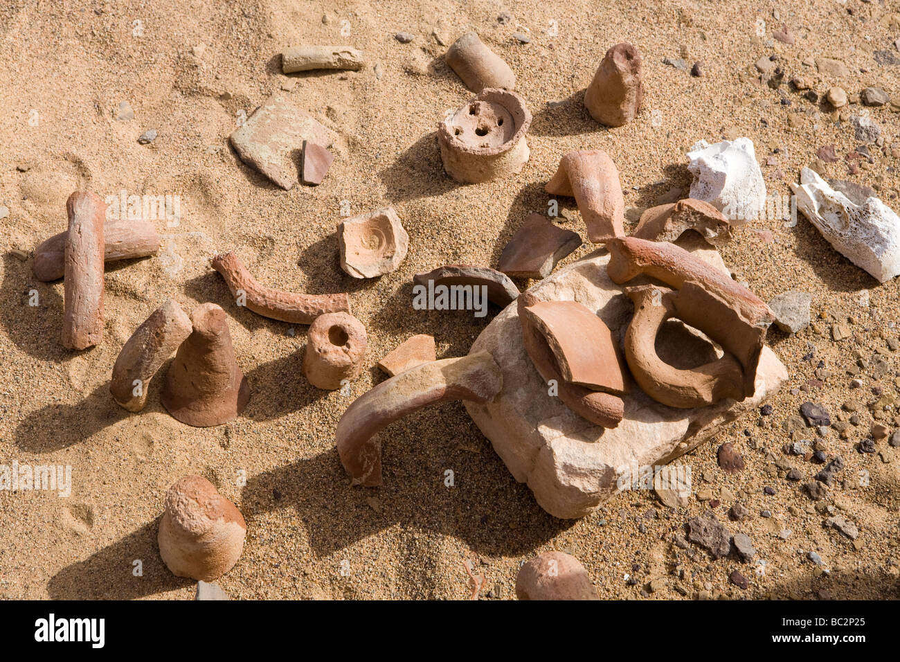 Sherds of Roman pottery on the wadi bed  in the Eastern Desert of Egypt , North Africa Stock Photo