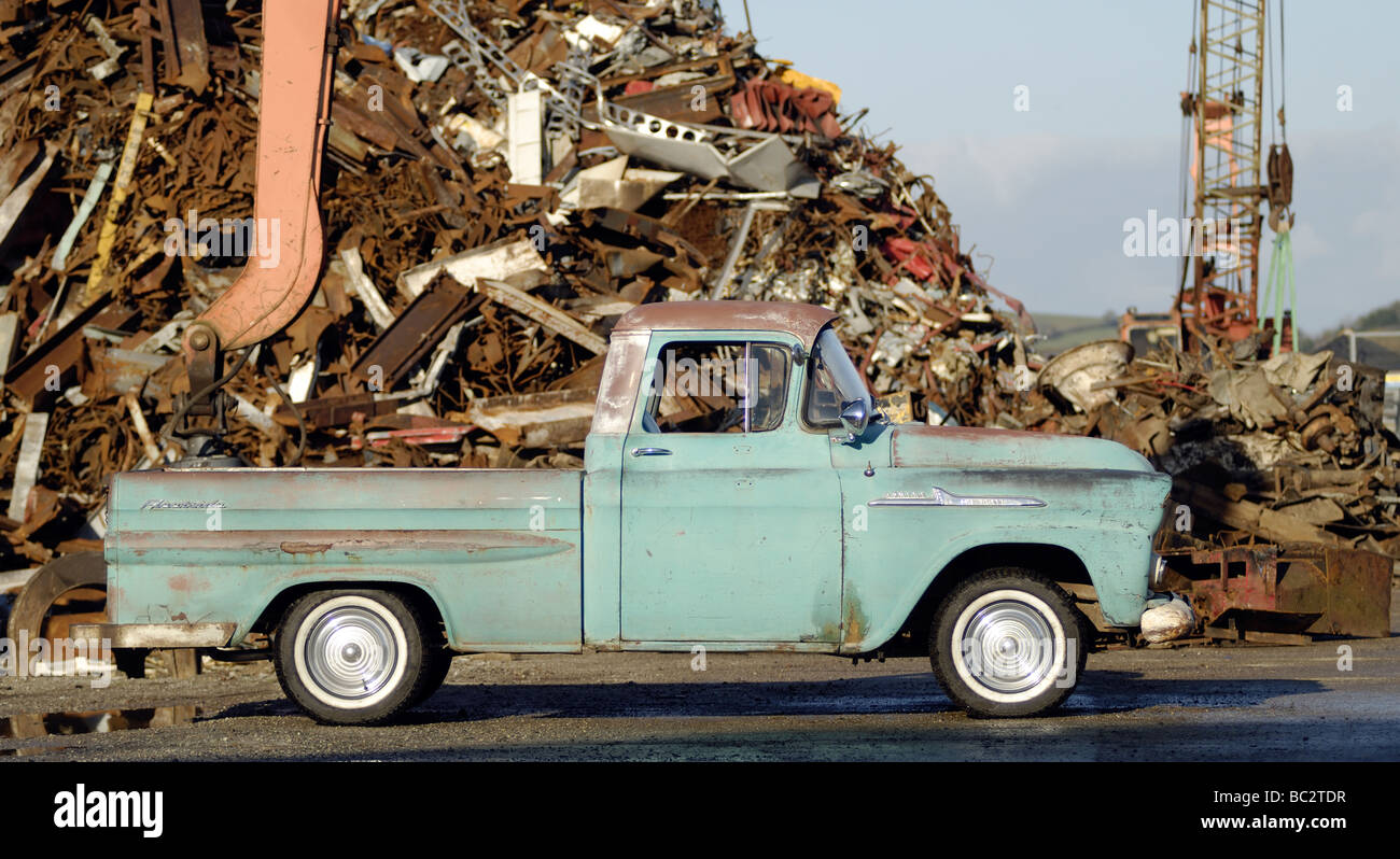 1958 Chevrolet Apache Fleetside. Shown from the right hand side. Located in a scrap metal reclaim yard. Stock Photo