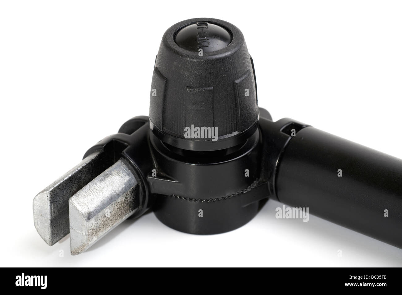 Metal alloy and plastic right angled serrated ratchet joint Stock Photo