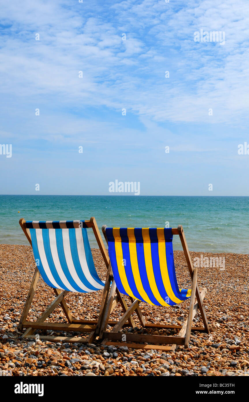Deckchairs on Brighton beach, Brighton, England Stock Photo Alamy
