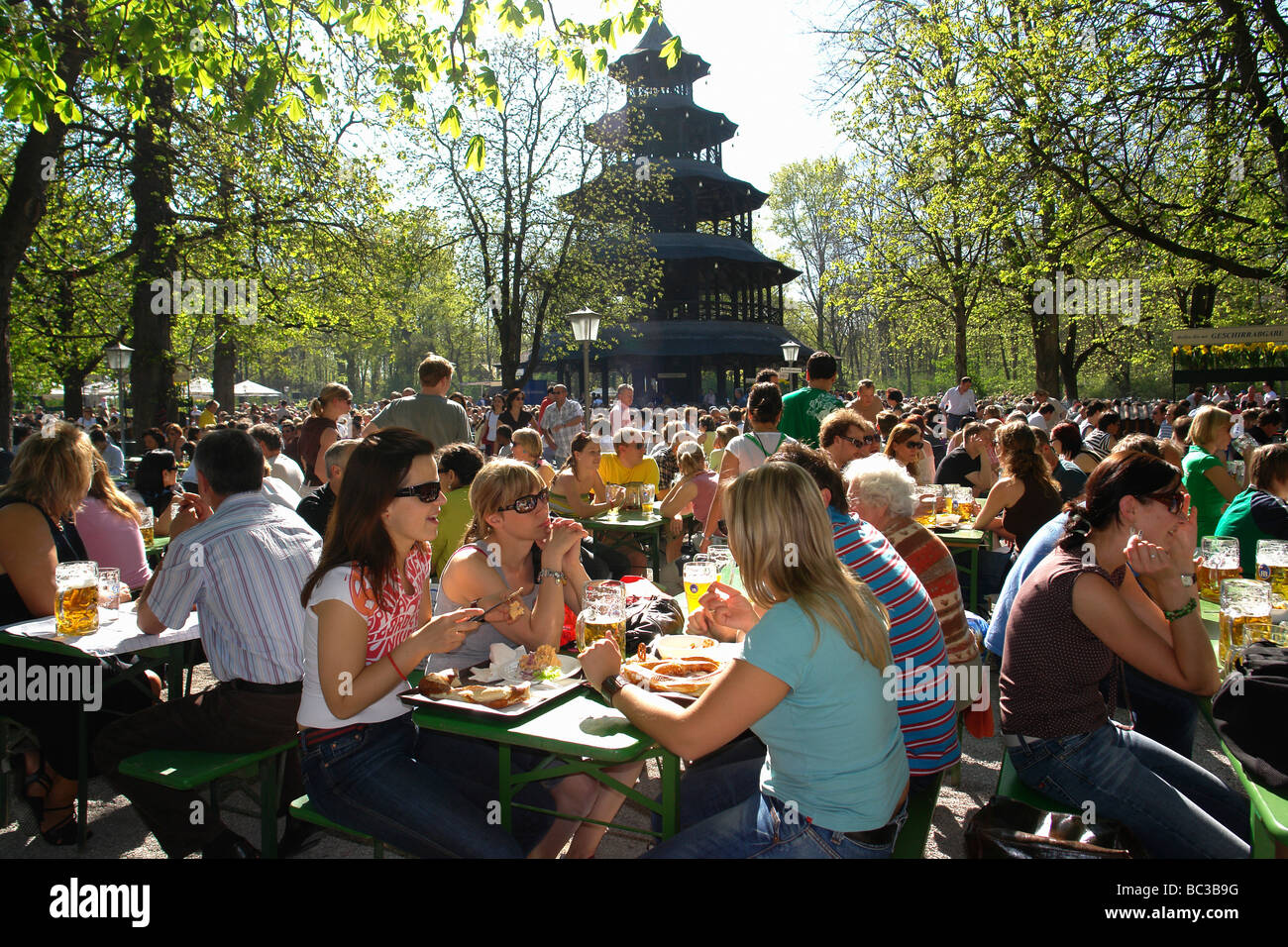 Beer garden at Chinese tower English Garden Munich Germany Stock Photo