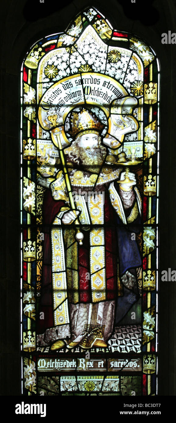 Stained glass window by the Kempe Studios, Depiction of Melchizedek, St Mary's Church,  Bloxham Oxfordshire Stock Photo