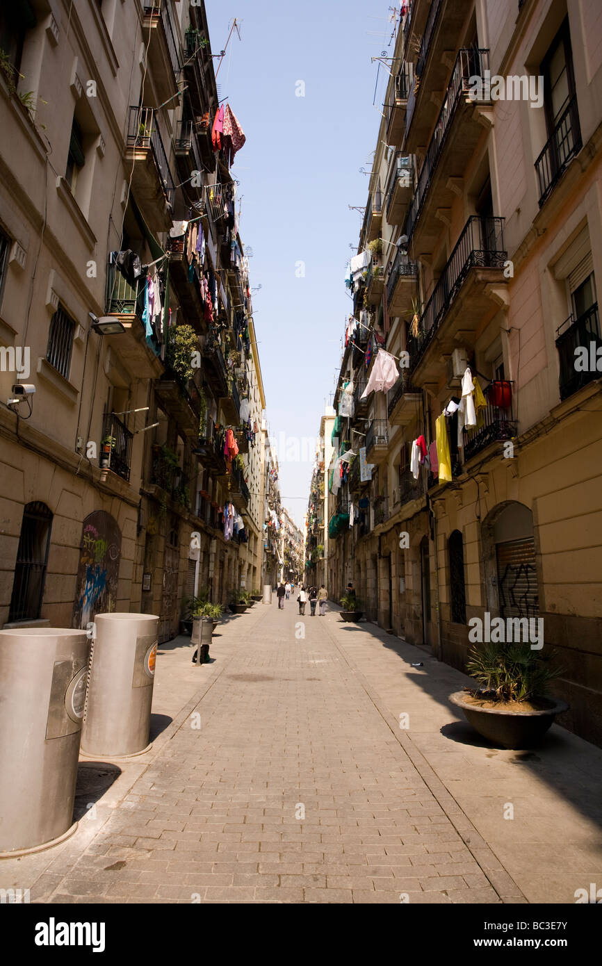 A quiet narrow back street in El Raval neighborhood in Barcelona, Catalonia, Spain. Stock Photo