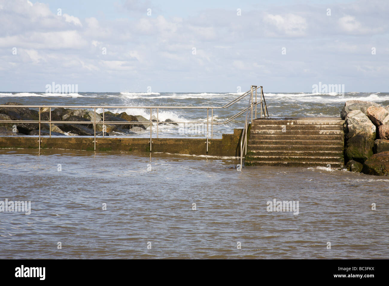The seawall at Staithes, protecting the harbour, North Yorkshire, England, UK. Stock Photo