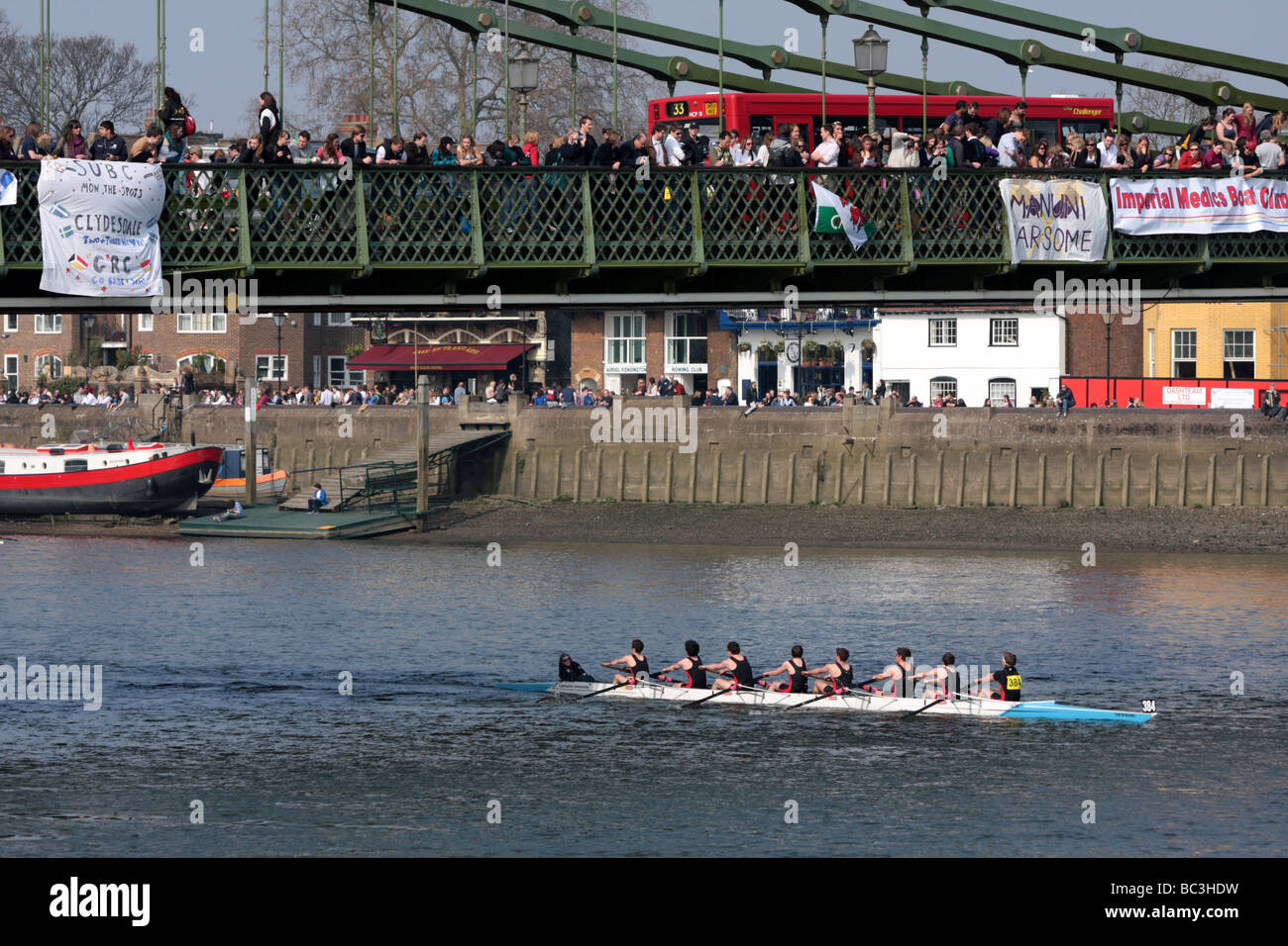 An Eight competing in the 'Head of The River' on the River Thames Stock