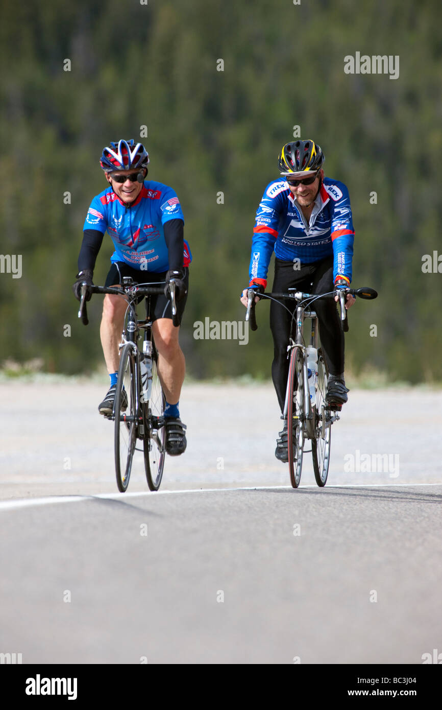 Cyclists riding on Highway 50 over Monarch Pass in Colorado during the annual Ride The Rockies bicycle tour Stock Photo