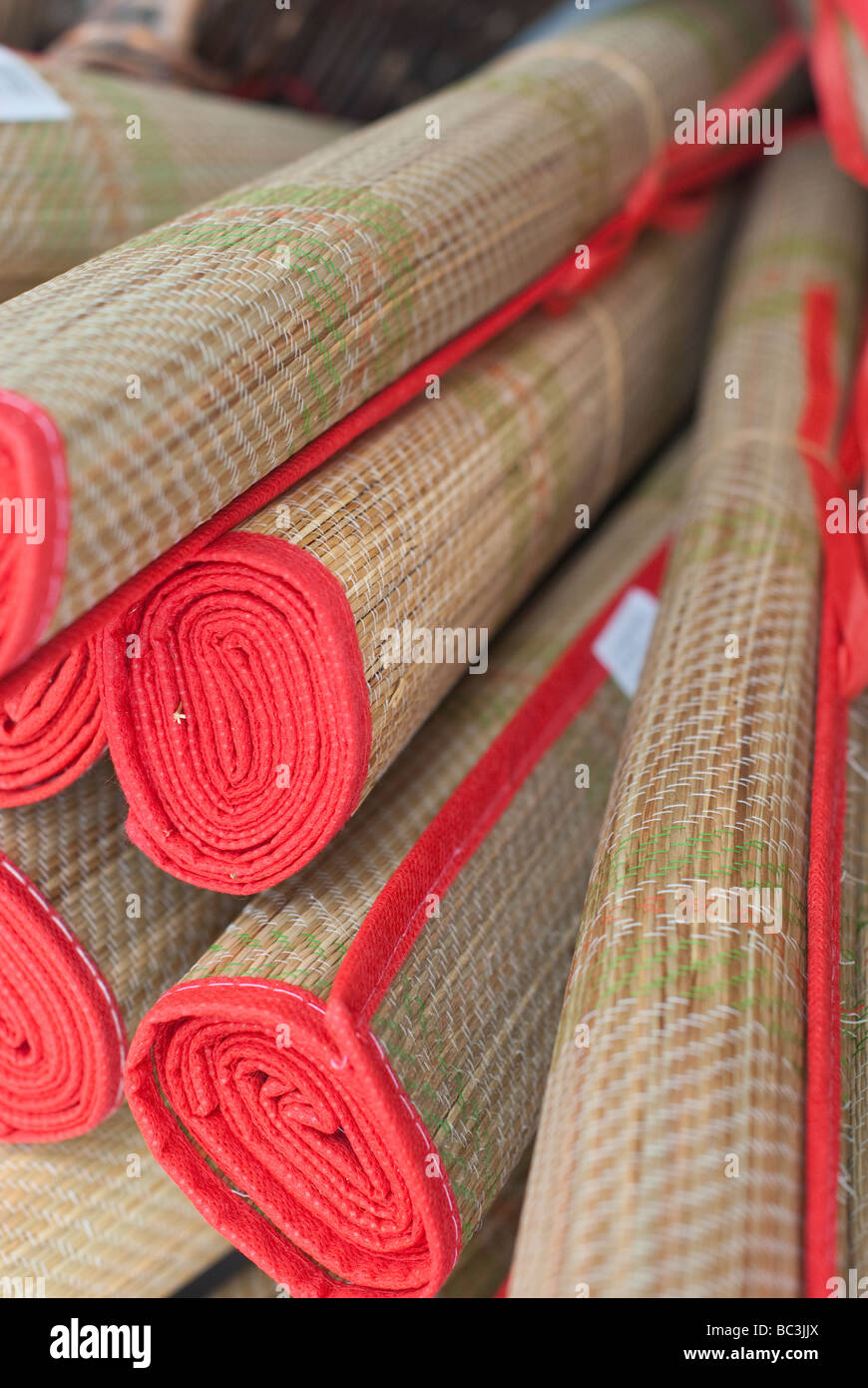 Beach Mats on sale at seaside resort Stock Photo Alamy