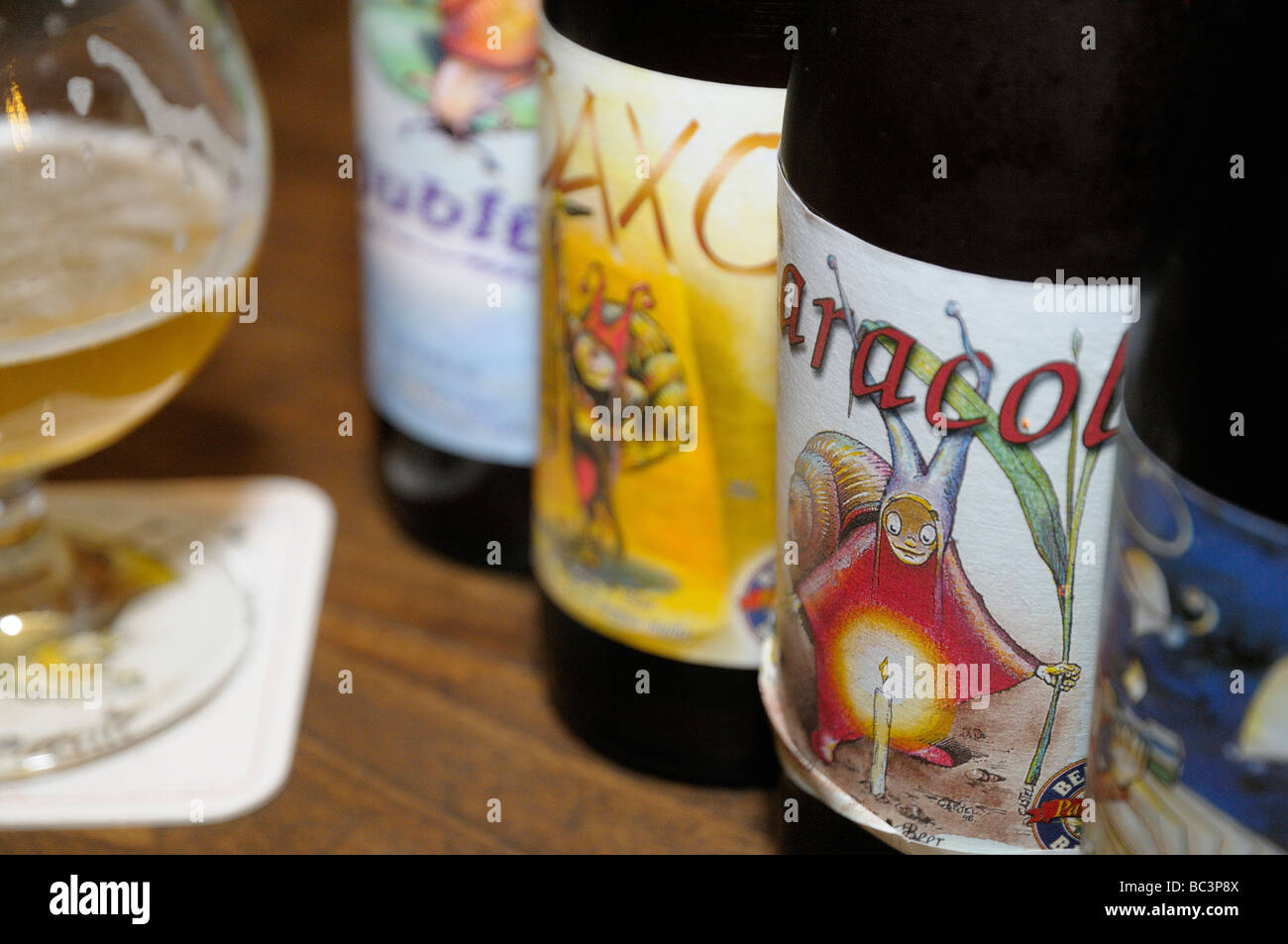 Range of beer bottles at artisan Caracole brewery in Falmignoul, Wallonia, Belgium. Stock Photo