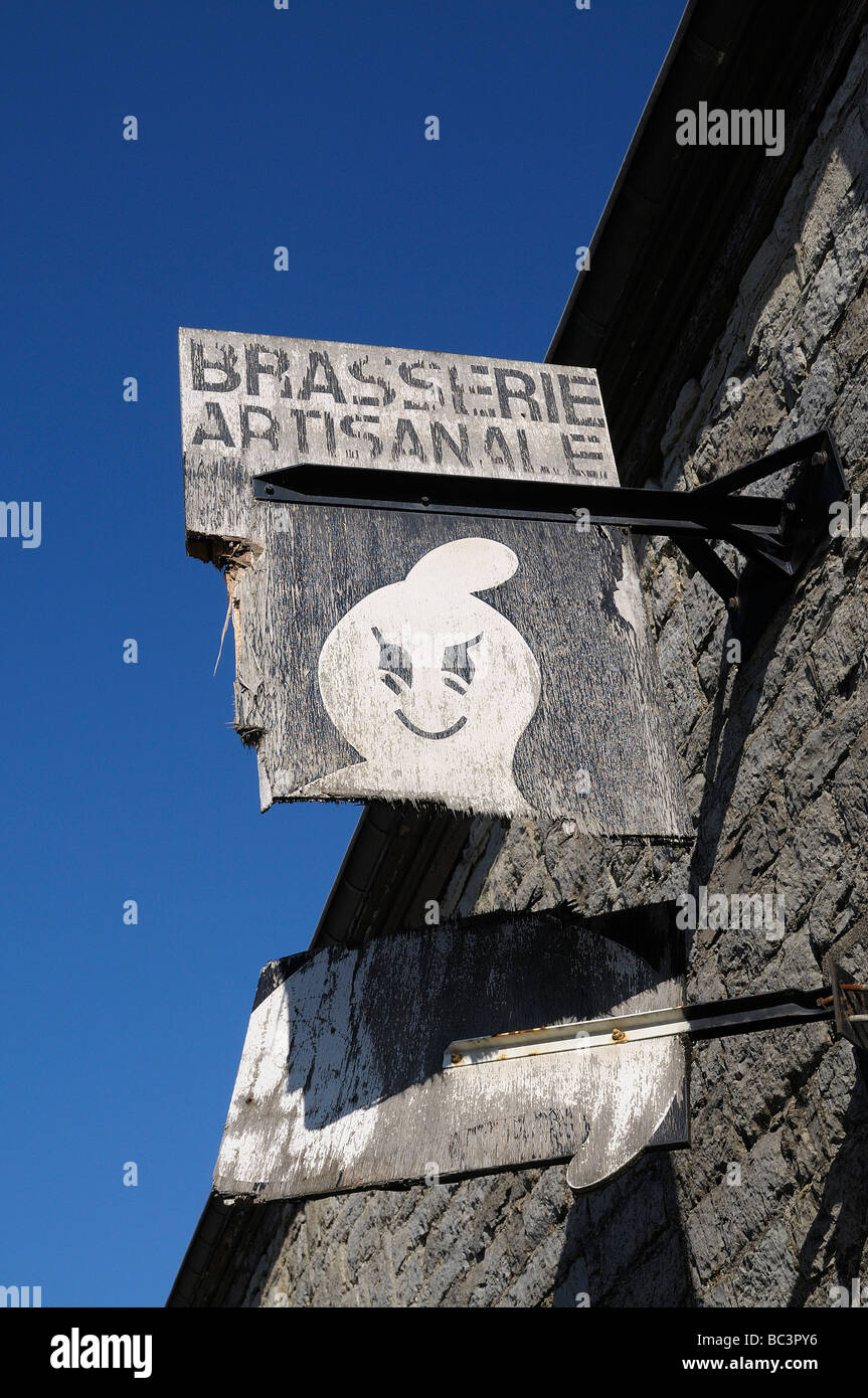 The broken and old sign for the artisanale Fantome Brewery in Belgium. Stock Photo