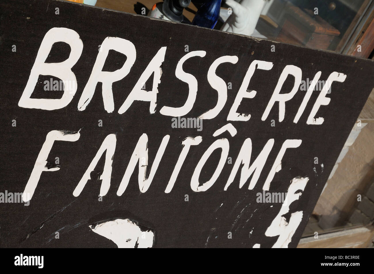 The sign of the Brasserie Fantome, a small brewery in the Ardennes region of Belgium. Stock Photo