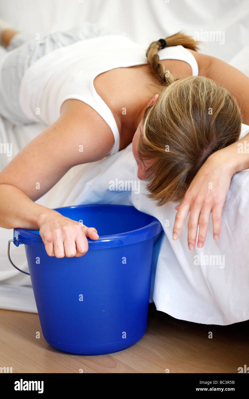 Woman is vomiting sickness Stock Photo