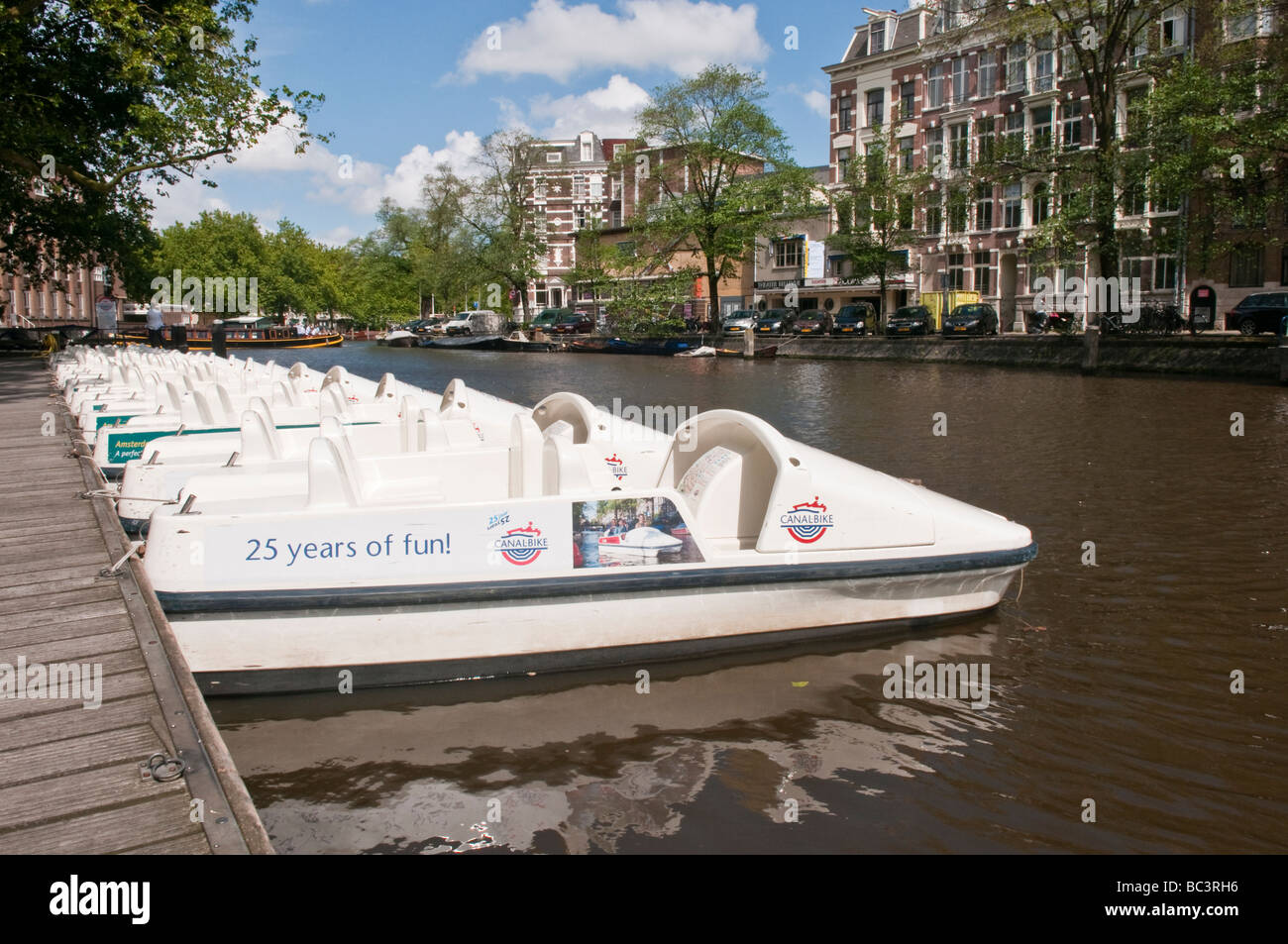 Pedalo pedal boats ready for hire on the Singelgracht canal, Amsterdam  Stock Photo - Alamy