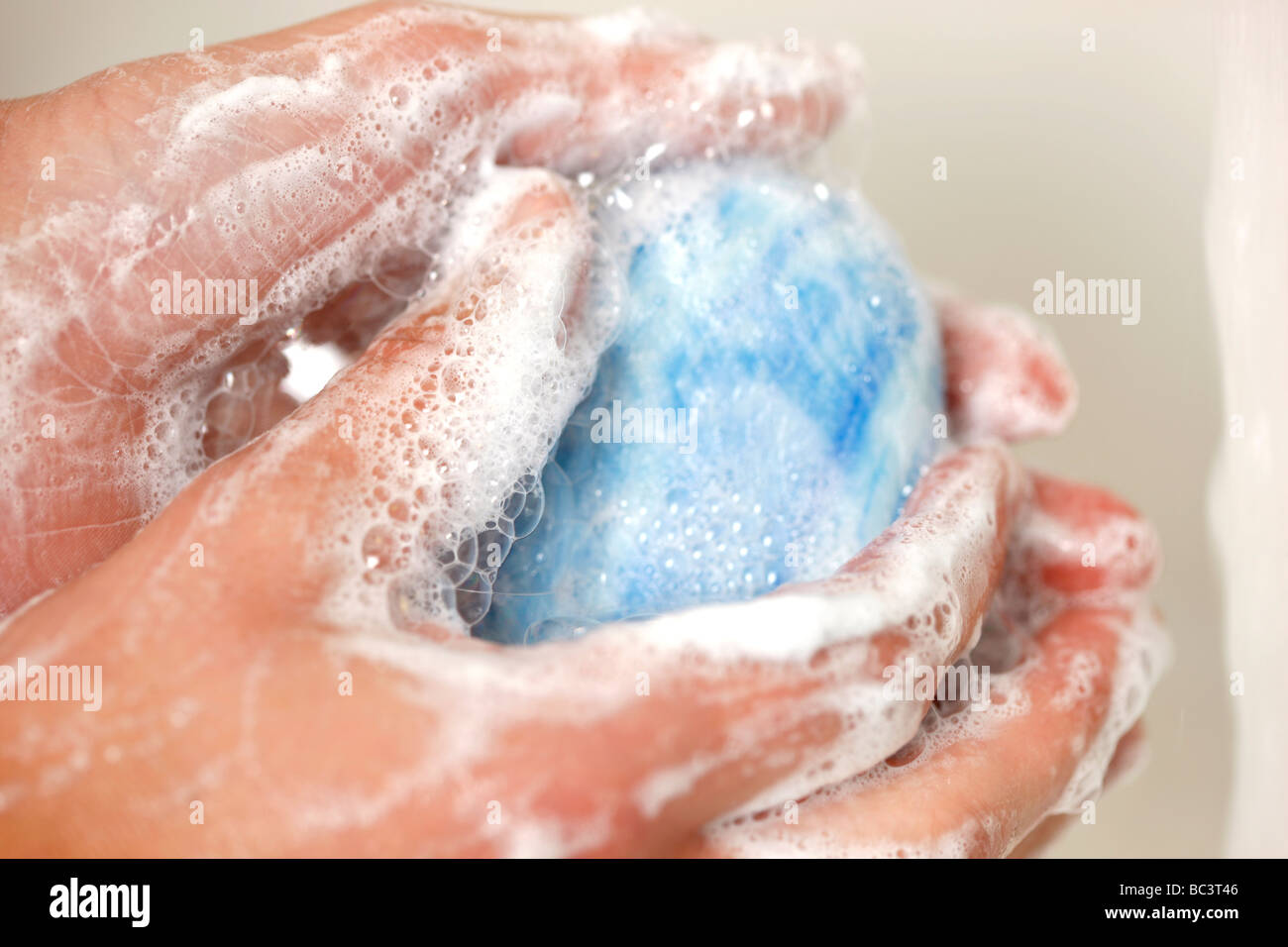 Hand washing with water and soap Stock Photo
